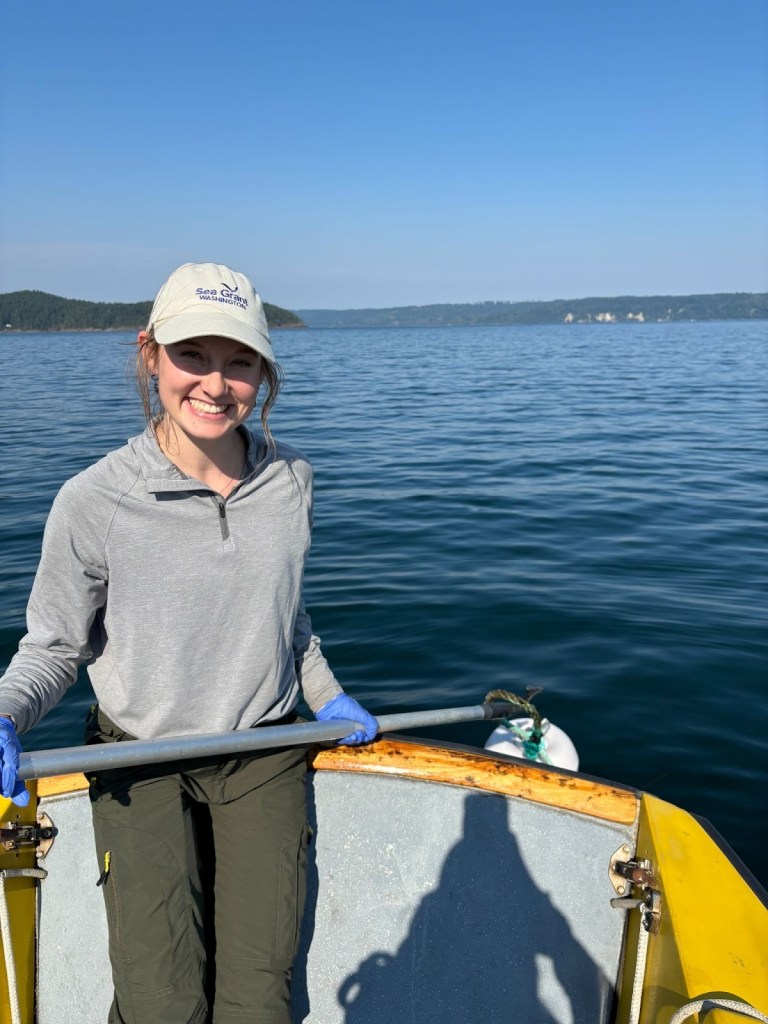Alt text: A photo of Maddie Gard on a boat