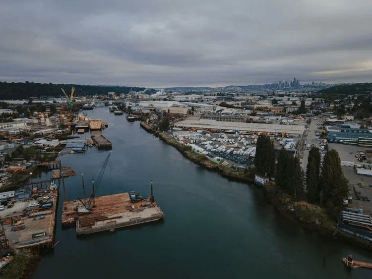 Alt text: Aerial photo of the Duwamish River’s industrialized shoreline