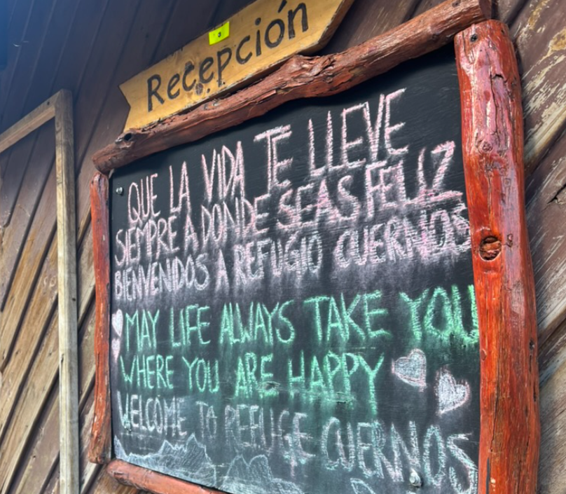 Alt text: A sign saying "May life always take you where you are happy."